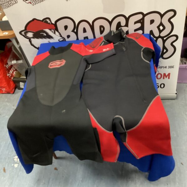 Pair of Gul wet suits in sizes L and S for watersports.