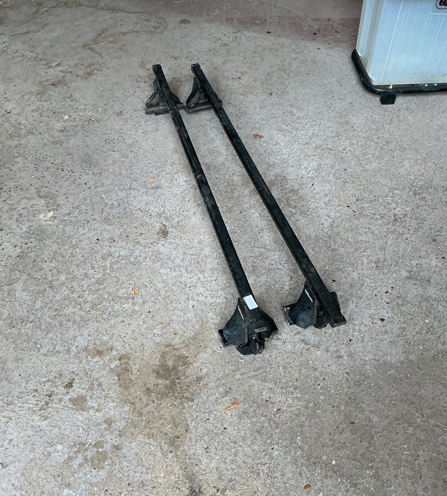 Halfords car roof bars for vehicle transport and storage.