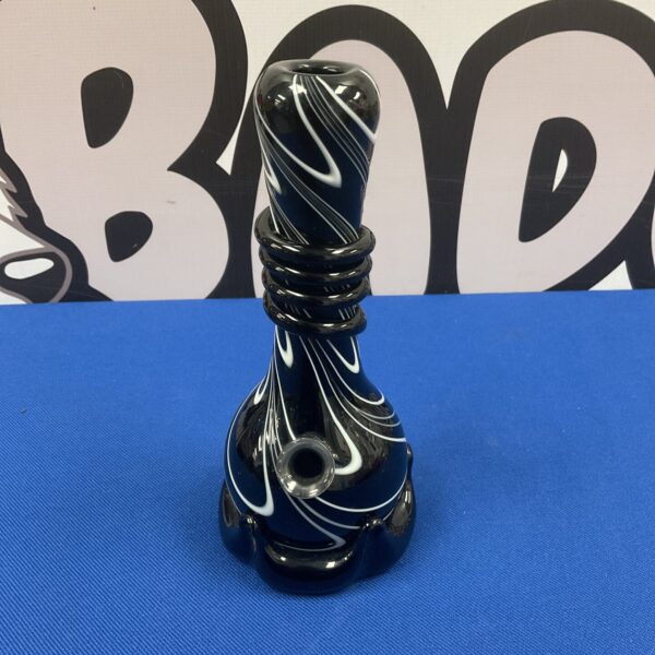 Stunning hand blown glass chillum pipe with black and white swirl design.
