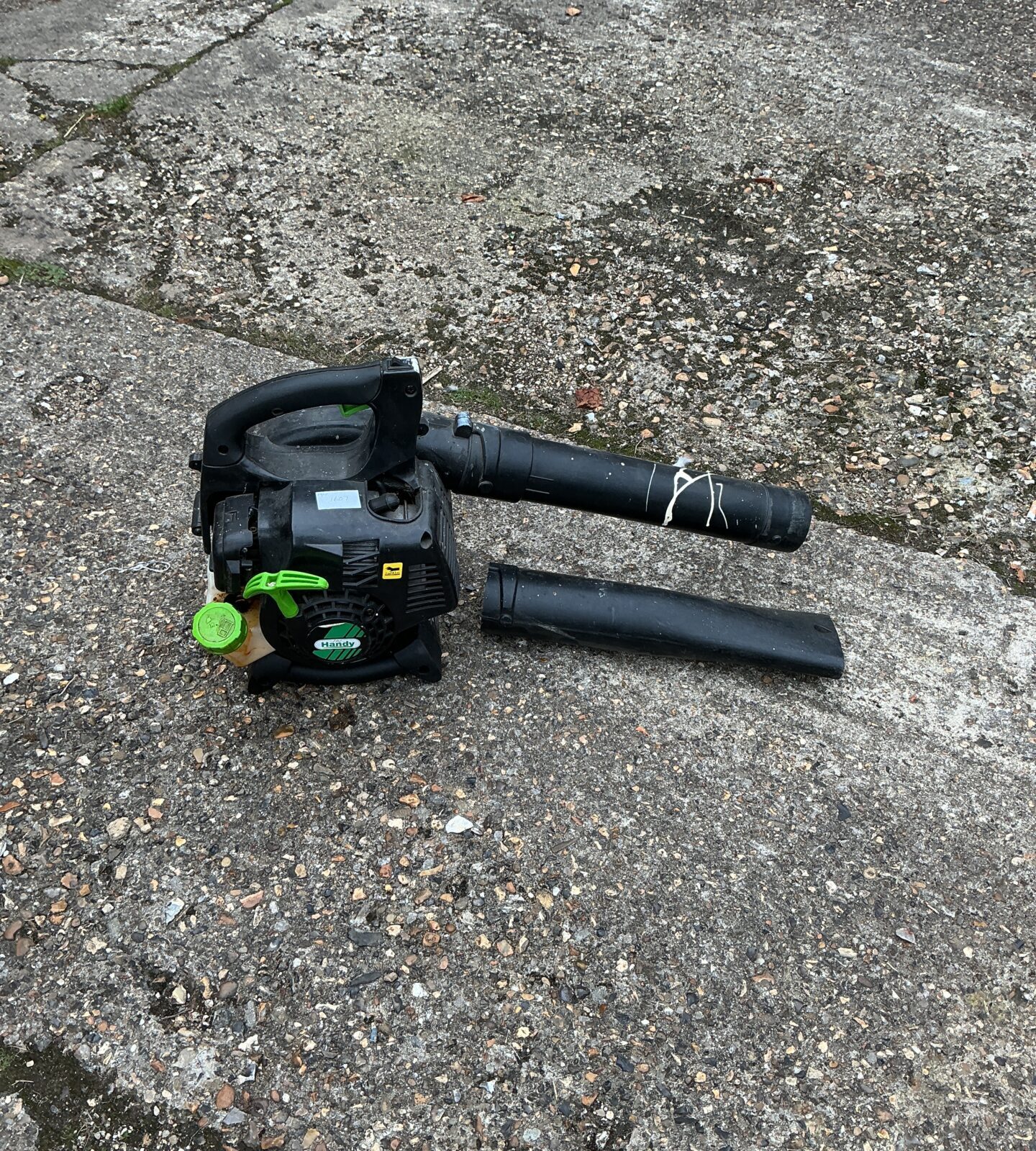 Handy petrol leaf blower for garden cleaning and debris removal.