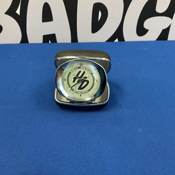 Front view of vintage Harley Davidson travel clock.