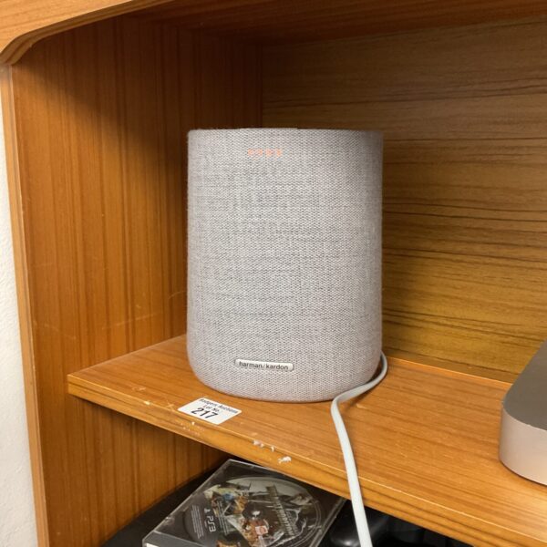 Harman Kardon wireless speaker in neutral fabric finish.