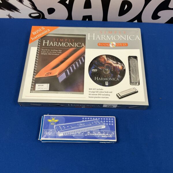 Vintage harmonica instruction set with bee illustration on cover.