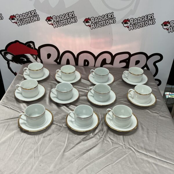 Vintage Harmony China cups and saucers set displayed on a table.
