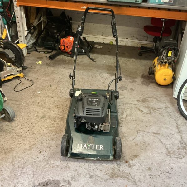 Vintage Hayter 48 petrol lawn mower in used condition.