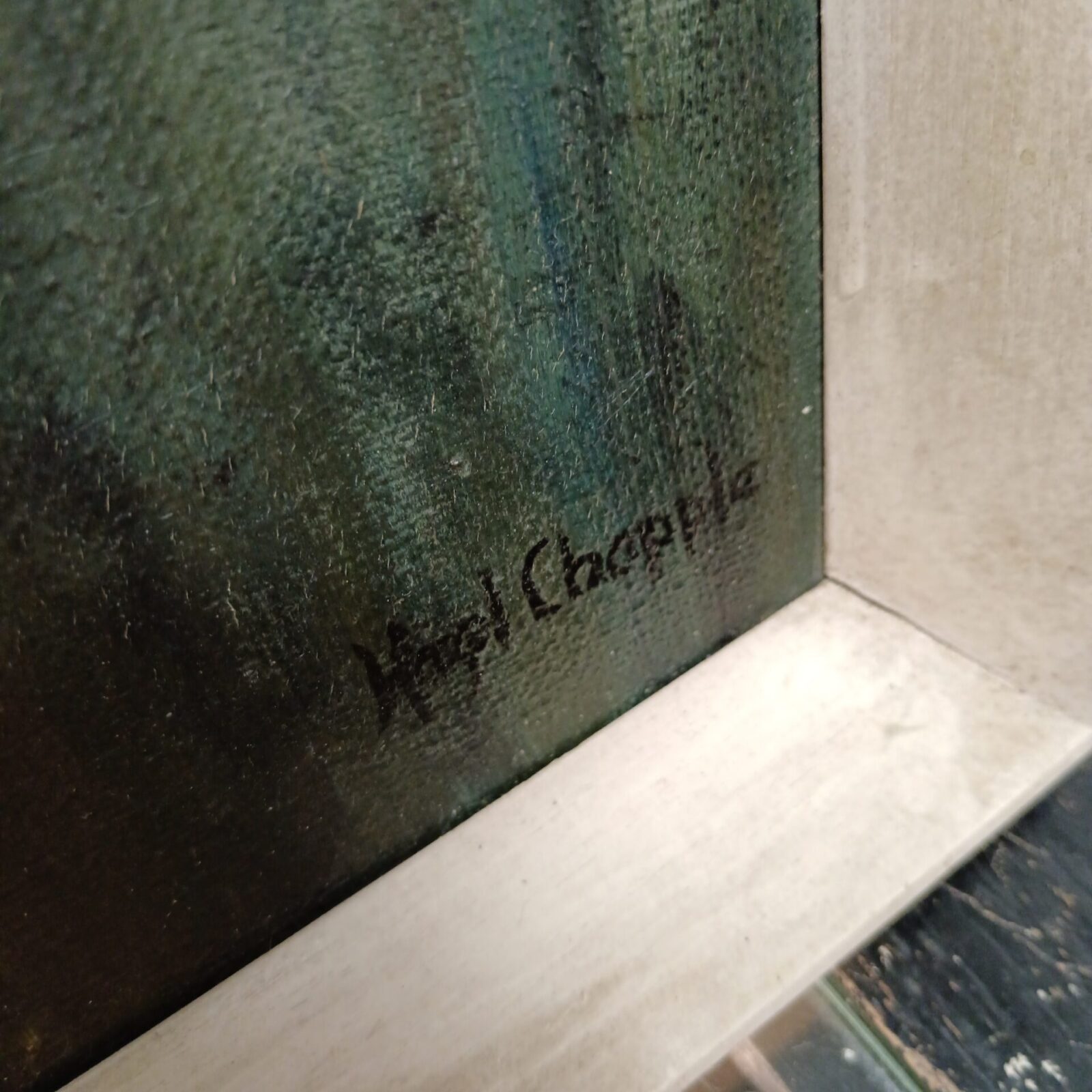 Close-up of Hazel Chapple's signature on the dog painting.