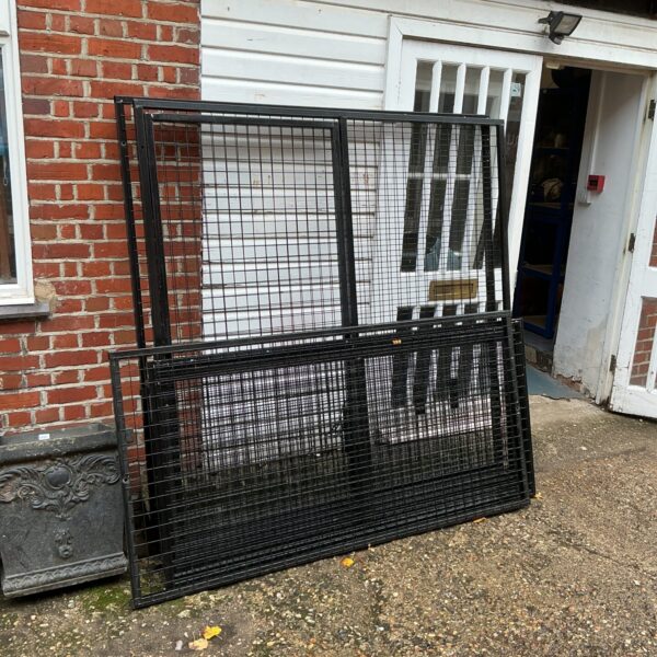 Heavy-duty mesh storage cage, ideal for secure industrial storage.