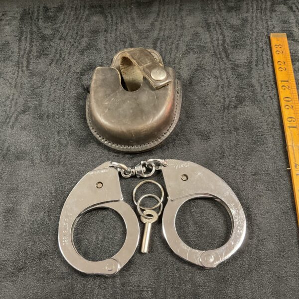 Vintage Hiatt handcuffs from the 1960s, issued to the Metropolitan Police.