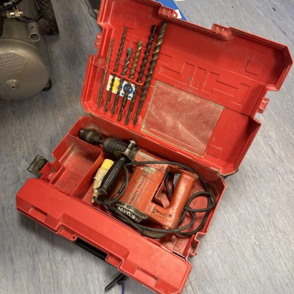 Hilti TE22 drill in open case with drill bits.
