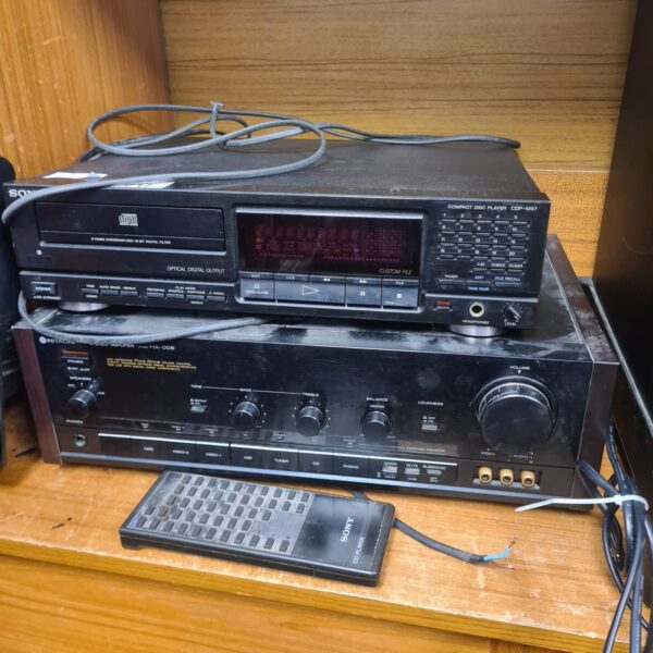 Vintage Hitachi stereo system with Sony CD player and remote control.