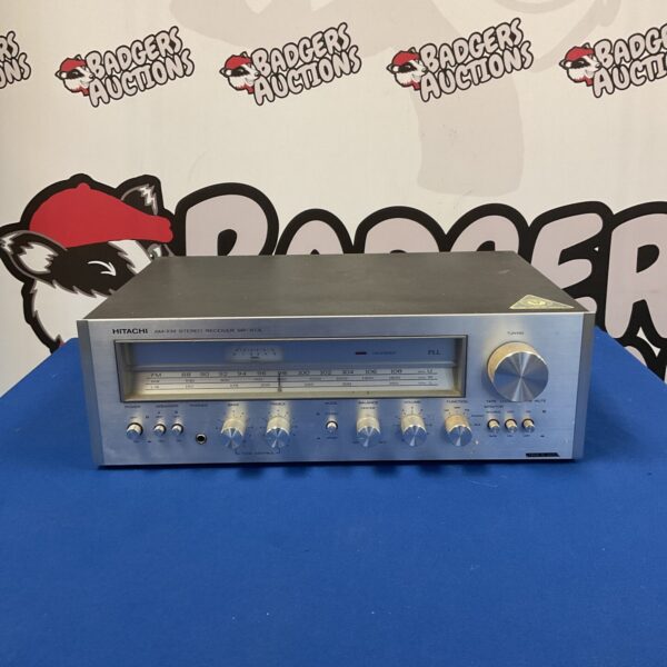 Vintage Hitachi SR-303L stereo receiver with tuning dials.