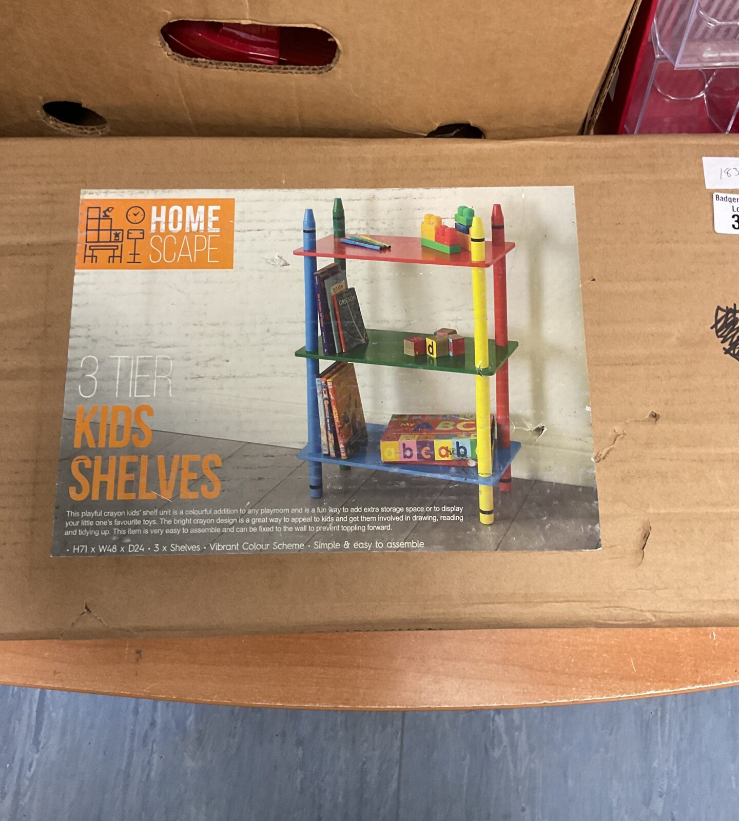 Colourful 3 tier kids bookcase from Home Scale for playroom storage.