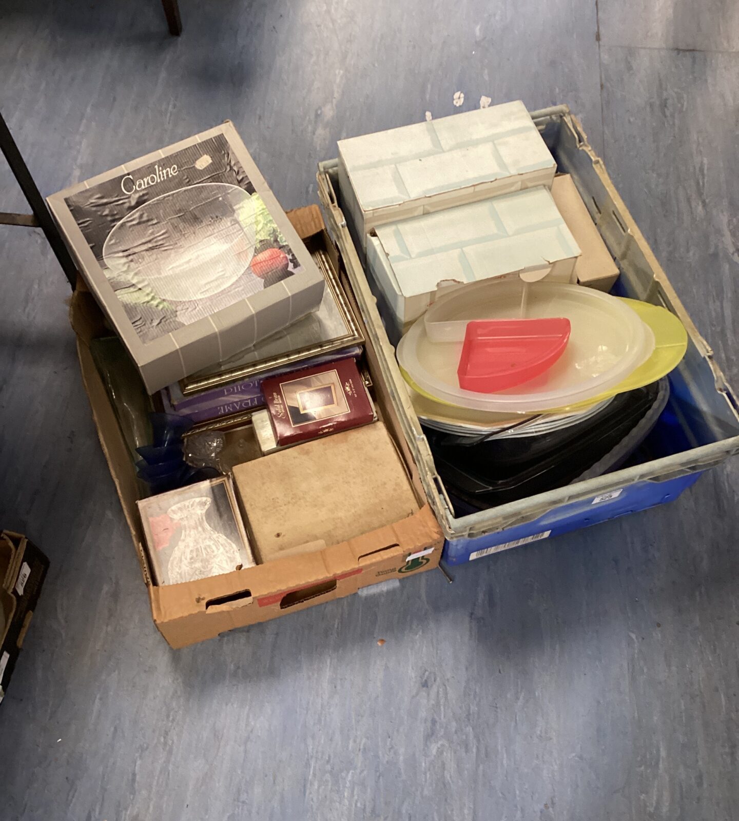Mixed house clearance lot with photo frames and kitchenware.