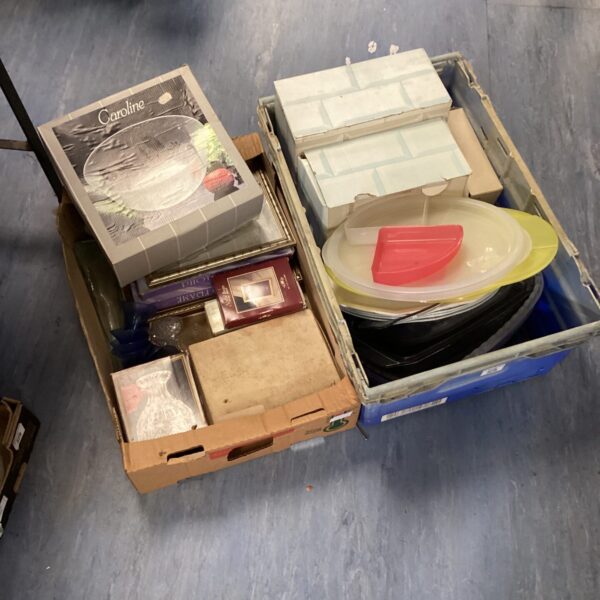 Mixed house clearance lot with photo frames and kitchenware.