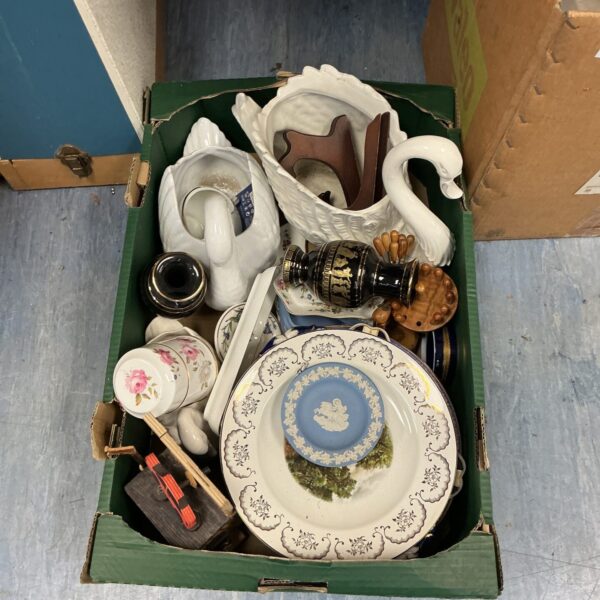 Vintage house clearance lot with swan pottery and ceramics.