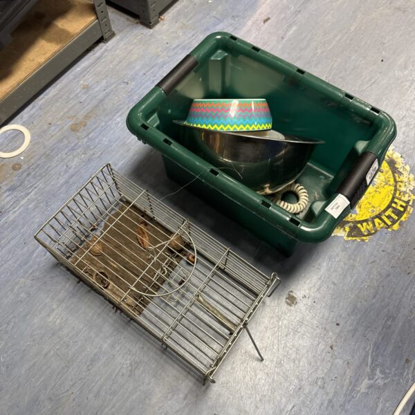 Mixed lot featuring a humane rodent trap and stainless steel dog bowl.