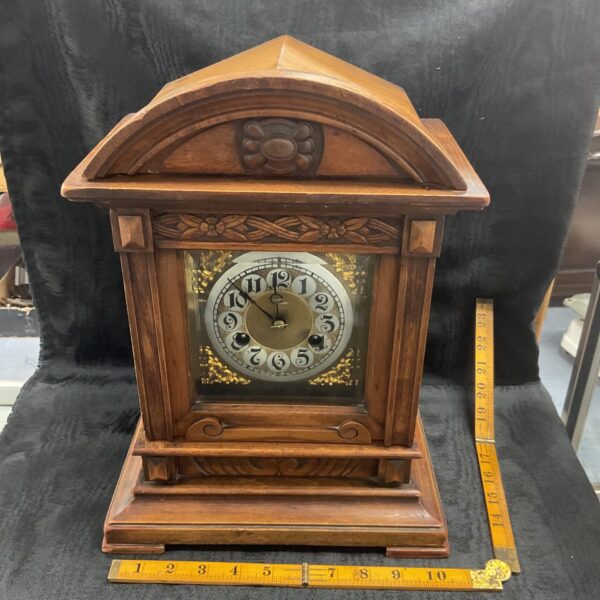 Antique Junghans Twin Gong clock with carved oak case.