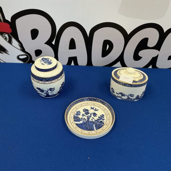 Royal Doulton blue and white ginger jar with detailed floral design.