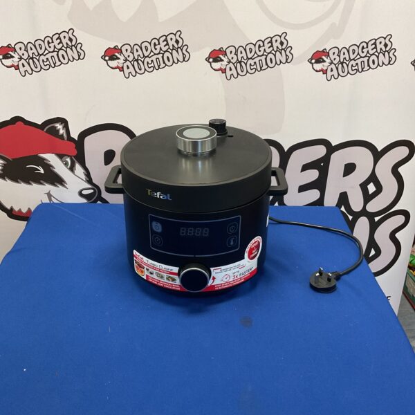 Stainless steel Tefal Turbo Cuisine pressure cooker with digital display.