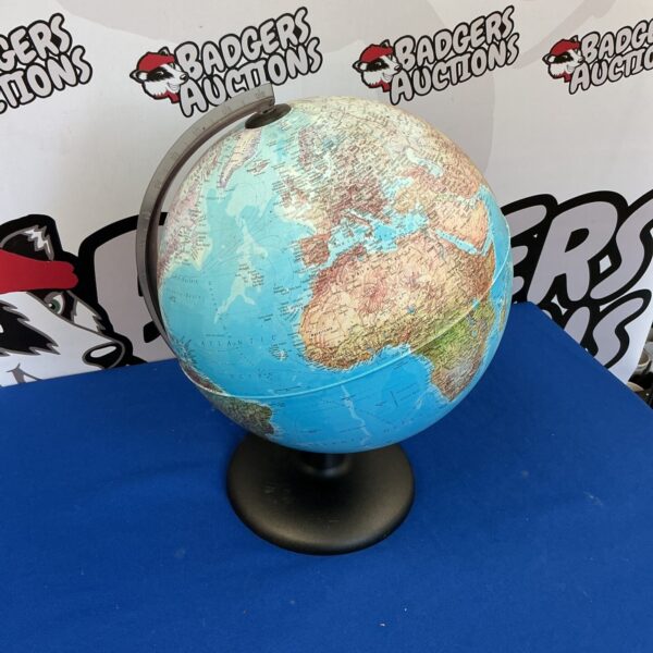 Detailed world globe on a stand for display and geographical learning.