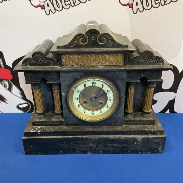 Antique Victorian slate mantle clock with pendulum.