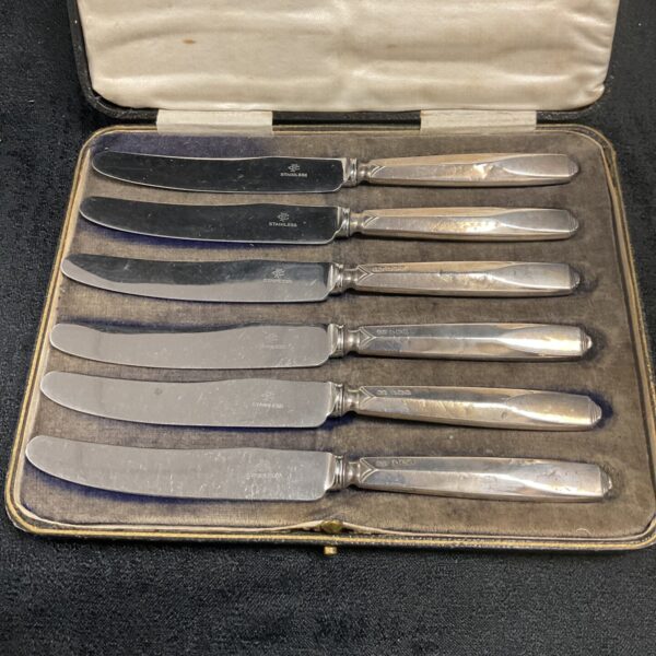 Vintage silver fruit knives in a fitted box, 1937 Frank Cobb set.