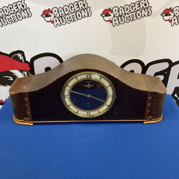 Vintage Resoanker Bim Bam mantle clock on display.