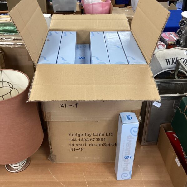 Two boxes of vintage dream spirals, a colourful 1980s craft toy.
