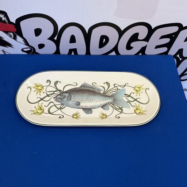 Vintage porcelain fish platter with hand-painted details.