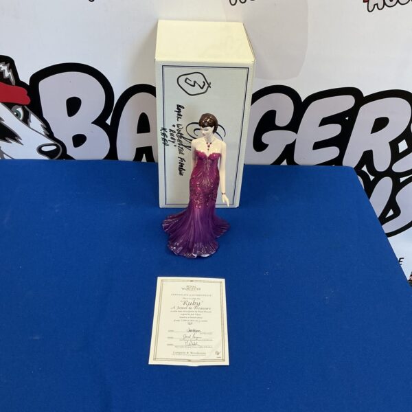 Comptonwoodhouse Ruby porcelain figurine with certificate and box.