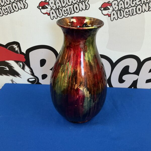 Vibrant Juliana ruby vase with swirling amber and gold glass.