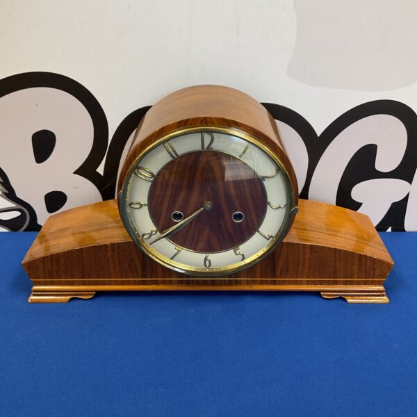 Vintage Smith Stanton buffet clock with wooden case.