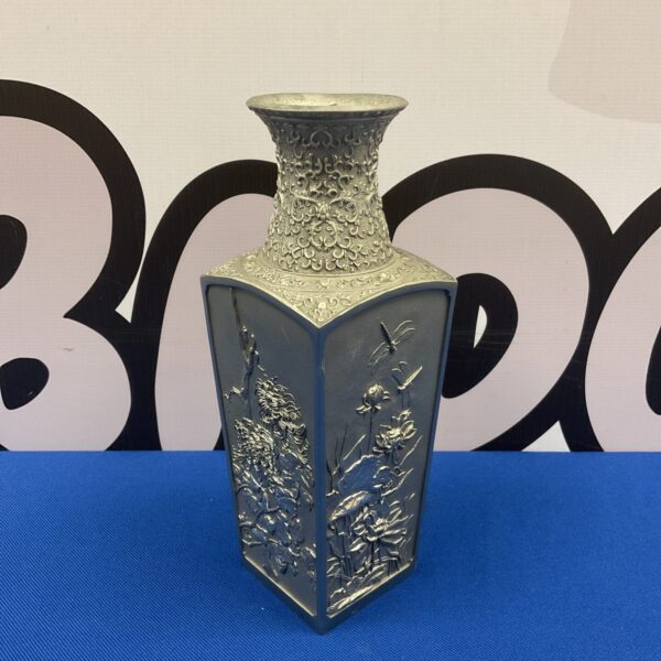 Detailed Royal Selangor pewter vase with fauna panels.