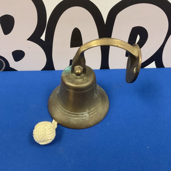 Vintage bronze pub last orders bell for collectors.