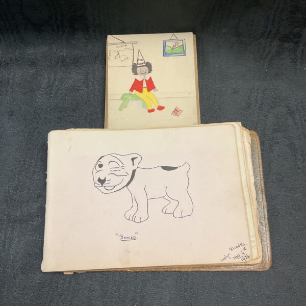 Vintage 1930s autograph book featuring Bonzo the dog illustration.