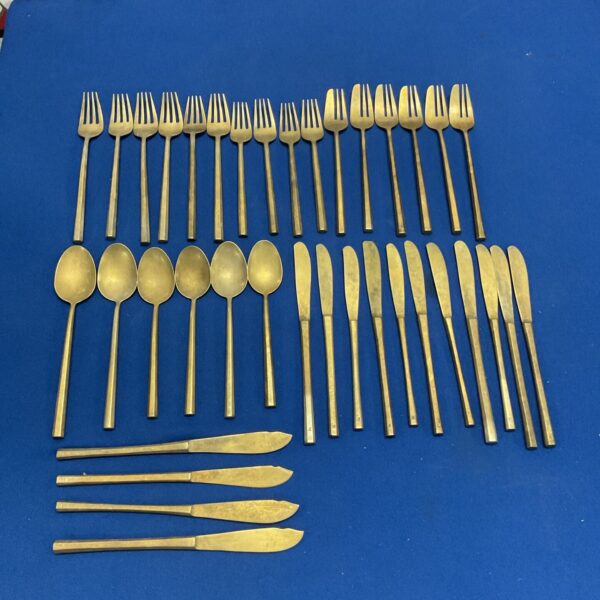 Vintage Sigvard Bernadotte Scanline cutlery set in bronze.