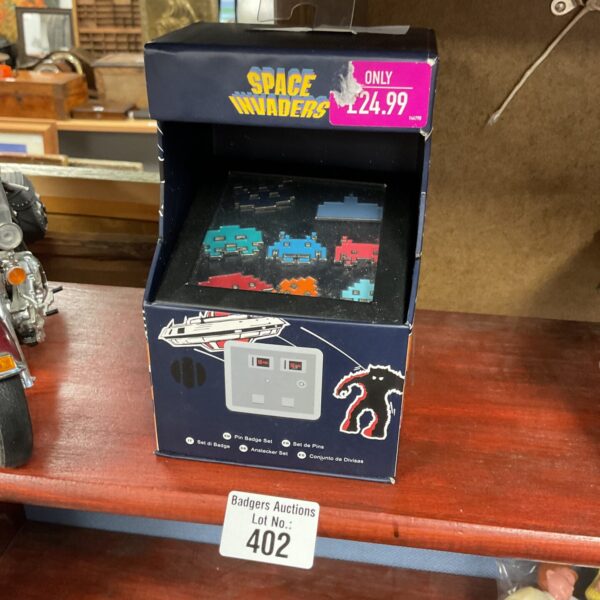 Numskull Space Invaders pin badges set in original packaging.