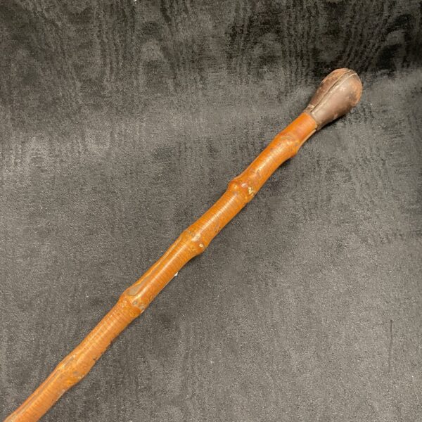 Vintage bamboo trench stick with weighted leather knop.
