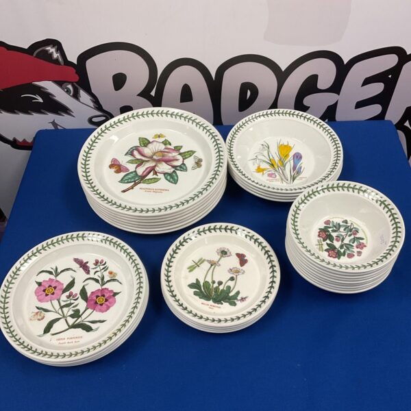Vintage Portmeirion Botanical Gardens dinnerware set with floral plates and bowls.