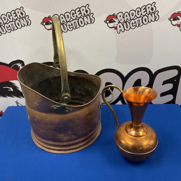 Vintage copper coal scuttle and pitcher for fireplace use.