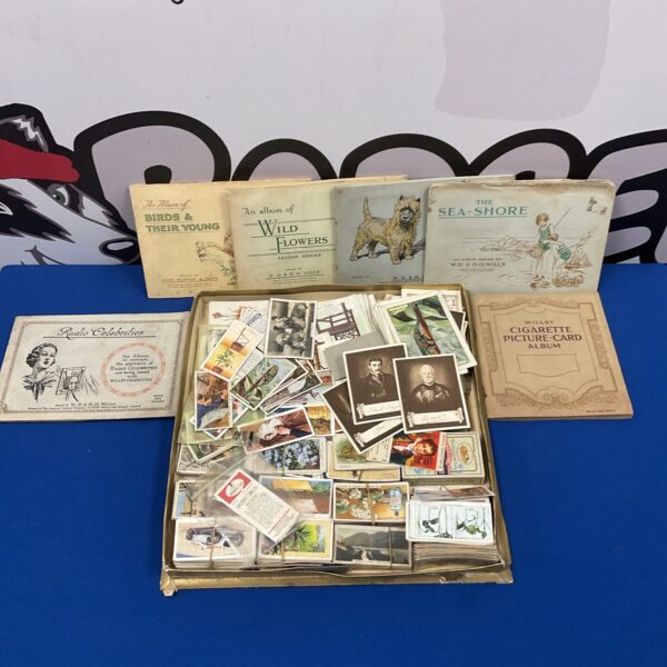 Vintage cigarette card album cover, showing a collection of cards.