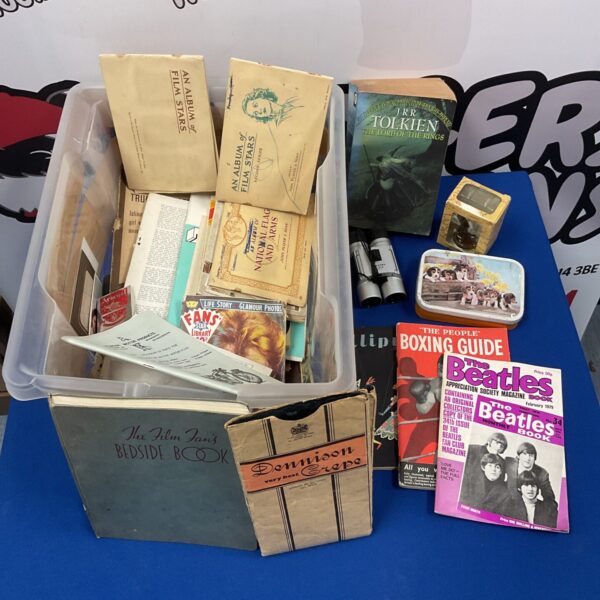 Mixed ephemera lot with vintage cigarette cards and a Tolkien book.