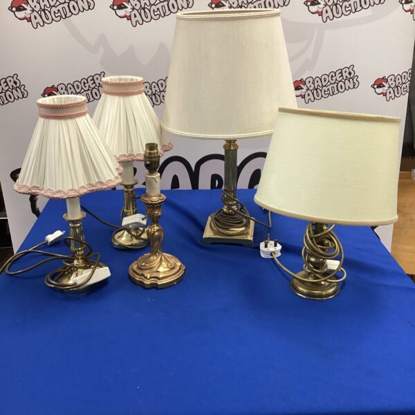 Lot of five vintage brass table lamps and one resin lamp.