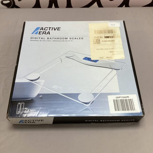 Close-up of Active Era digital bathroom scales in used condition.