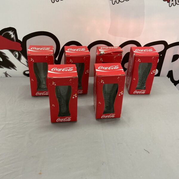 Vintage Coca Cola glass set for collectors.
