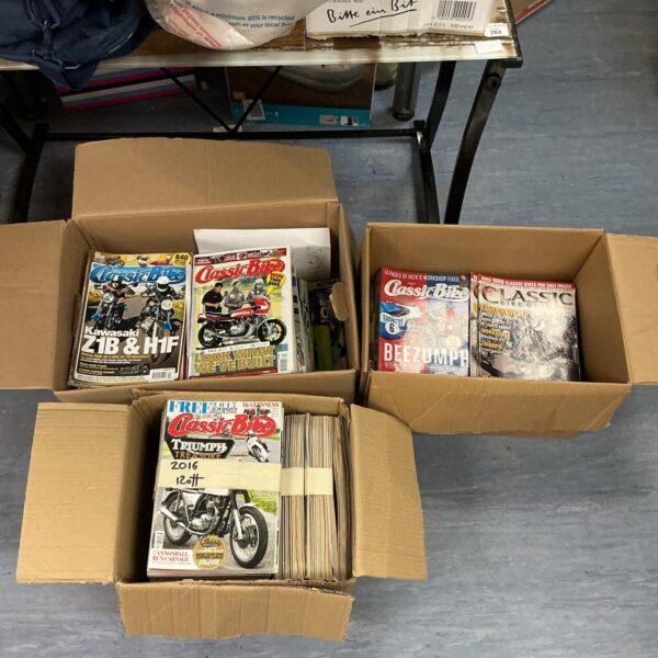 Stack of vintage classic bike magazines for collectors.