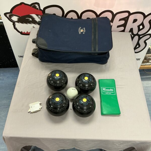 Vintage Almate bowls set with a blue holdall for lawn bowling.