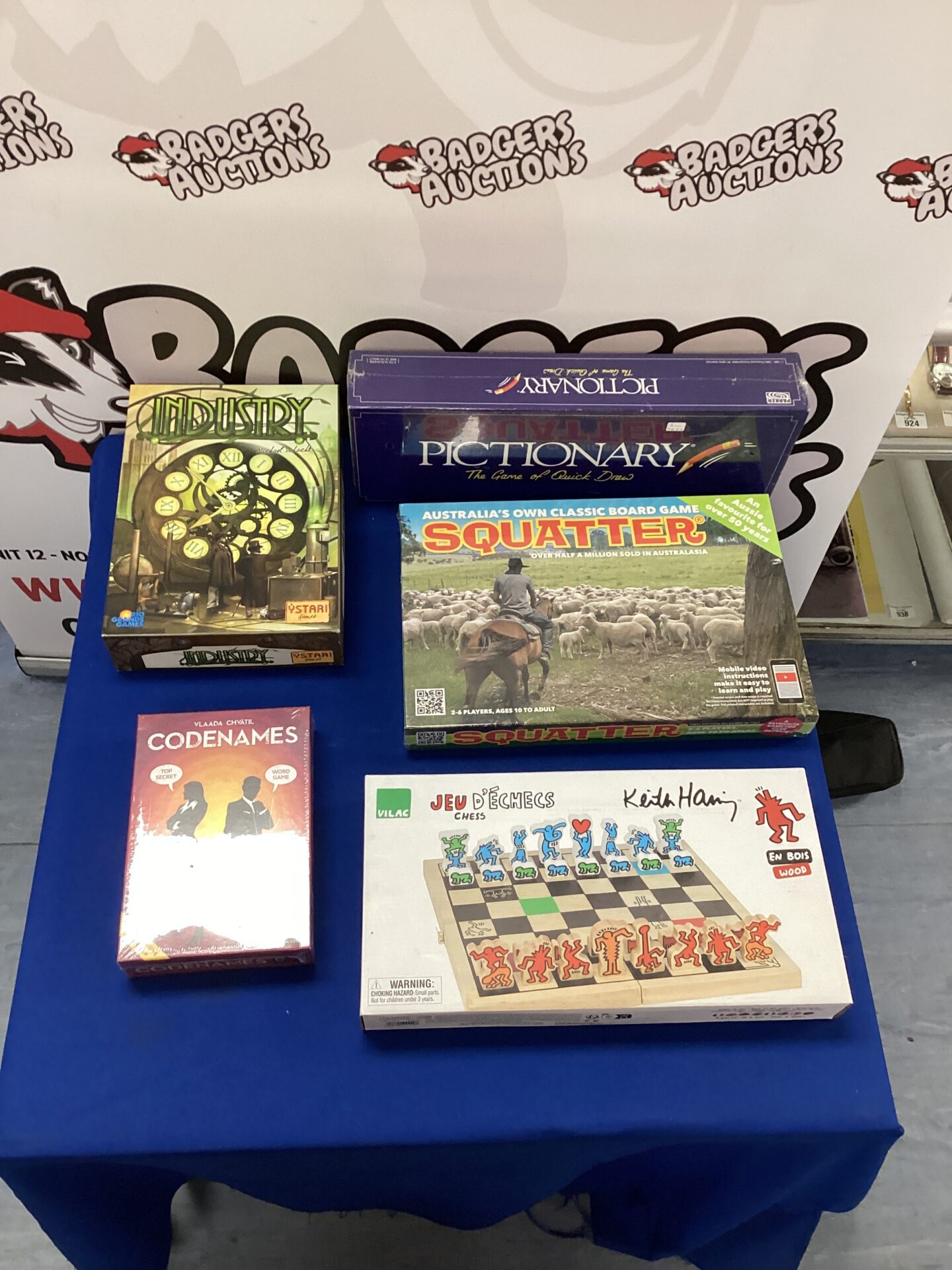 Five board games inc Australia’s own classic board game squatter, codenames, pictionary, industry & jeu d’echecs, Four are new & sealed