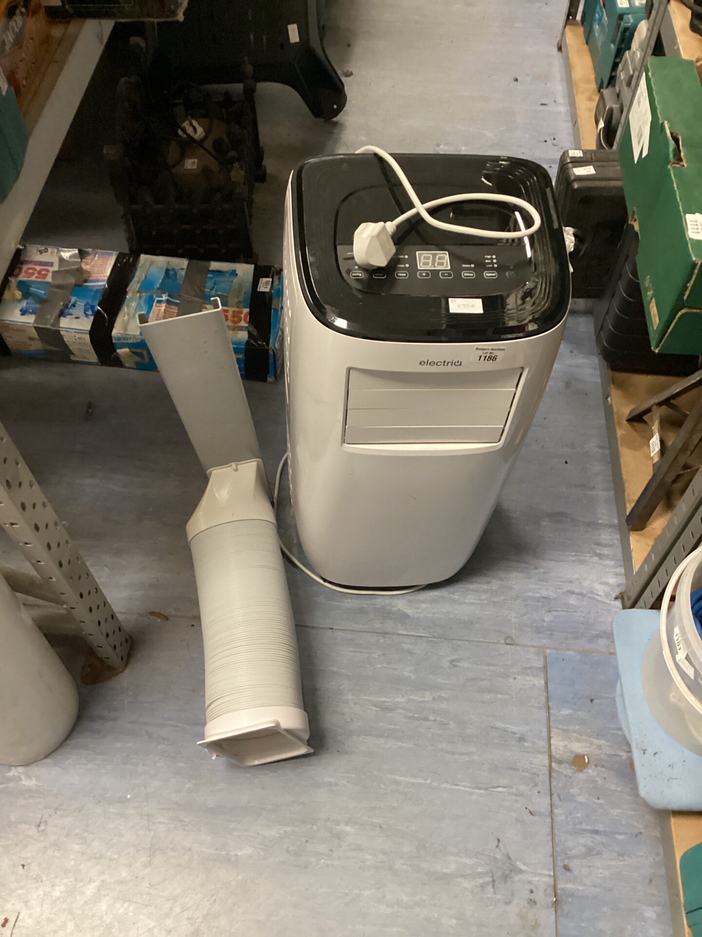 electriq air con unit (one caster needs reattaching)