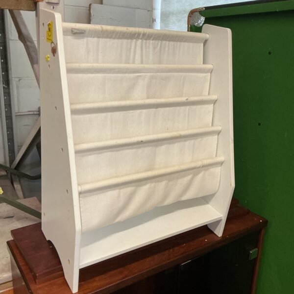 White wooden shoe storage unit with multiple tiers.